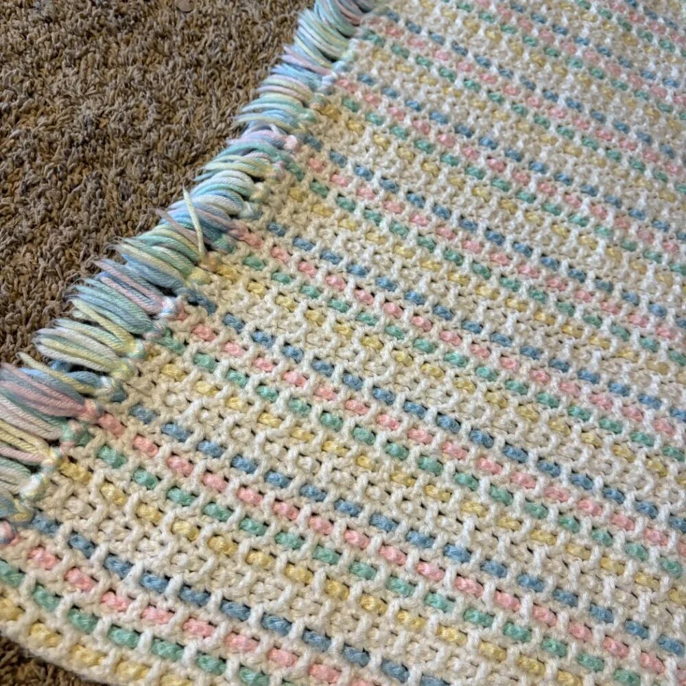 Handmade gender neutral colorful fringe knitted baby blanket